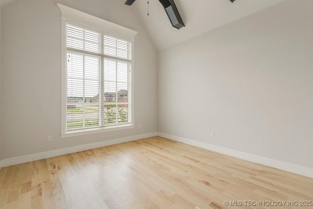 5918 E 126th Pl S, Bixby, OK 74008 - spare room with vaulted ceiling, a ceiling fan, and wood finished floors