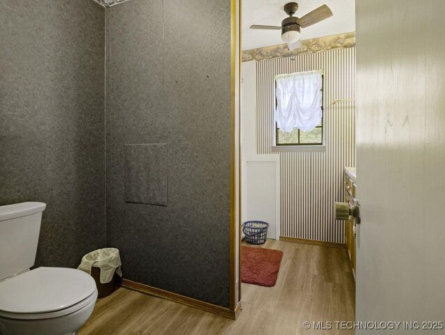 311 Washington Ave, Boswell, OK 74727 - bathroom with wood finished floors and ceiling fan