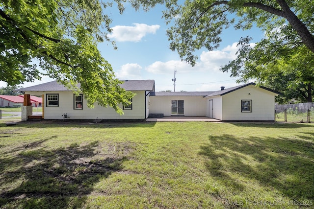 1119 W 7th St, Okmulgee, OK 74447 - rear view of property featuring a patio area