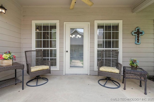 8306 E 77th Pl, Tulsa, OK 74133 - view of exterior entry with ceiling fan and a patio area