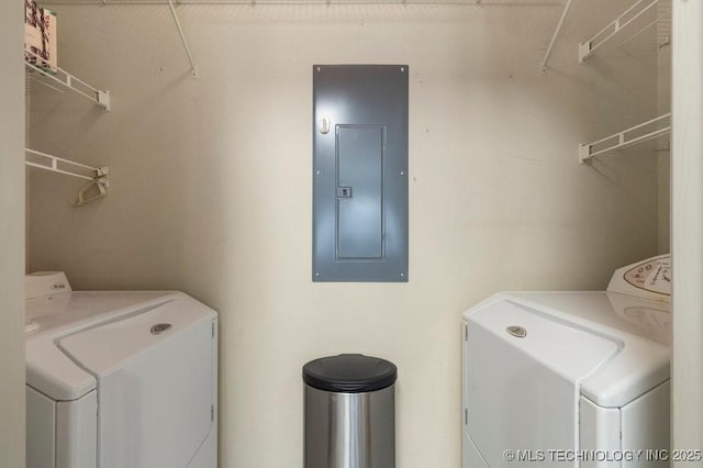 8306 E 77th Pl, Tulsa, OK 74133 - laundry room featuring electric panel and washer and dryer