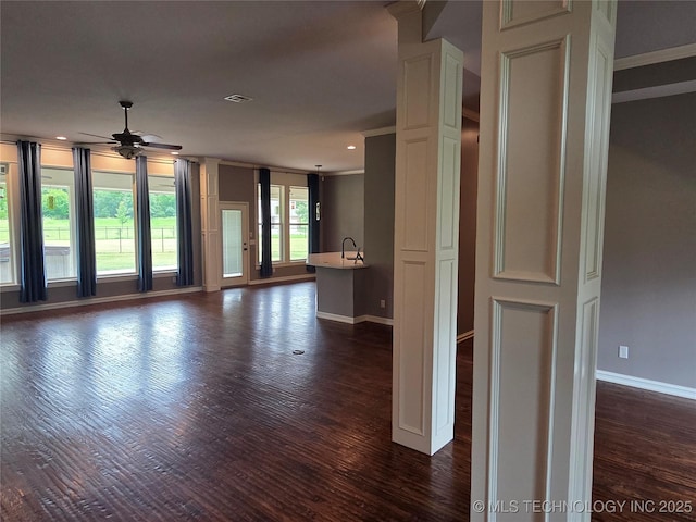 14772 S 212th E Ave, Coweta, OK 74429 - unfurnished living room with dark wood finished floors, ceiling fan, ornamental molding, and recessed lighting