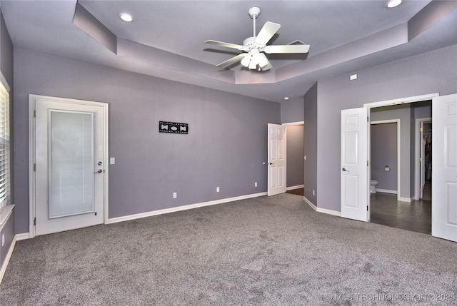 14772 S 212th E Ave, Coweta, OK 74429 - unfurnished bedroom with a raised ceiling, carpet flooring, recessed lighting, and ceiling fan