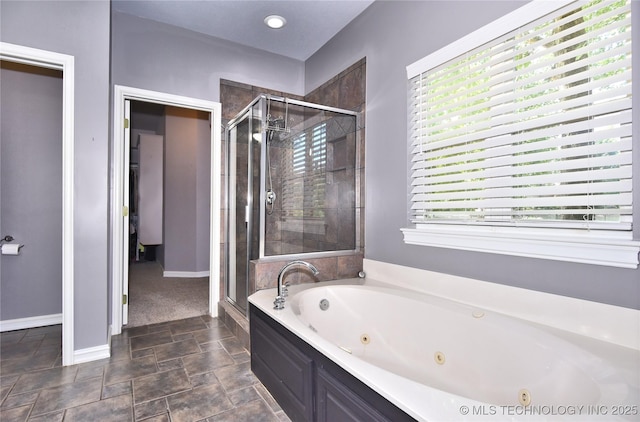 14772 S 212th E Ave, Coweta, OK 74429 - bathroom with a shower stall, a tub with jets, and stone finish floors