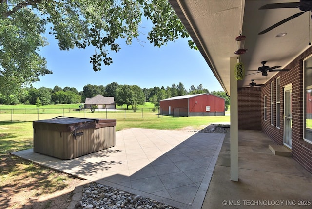 14772 S 212th E Ave, Coweta, OK 74429 - fenced backyard with a hot tub, ceiling fan, and a patio area