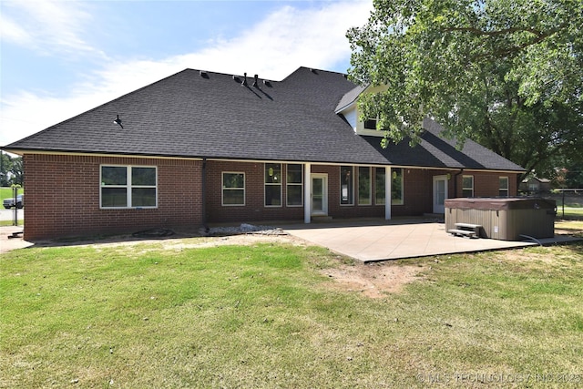 14772 S 212th E Ave, Coweta, OK 74429 - back of house featuring a hot tub, a patio area, roof with shingles, and brick siding