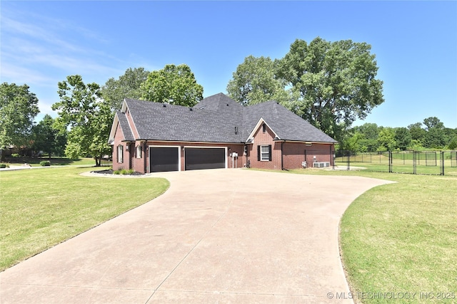 14772 S 212th E Ave, Coweta, OK 74429 - view of front of house with brick siding, a garage, driveway, and roof with shingles
