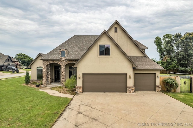 14651 S Gary Ave, Bixby, OK 74008 - french country style house featuring stone siding, stucco siding, driveway, and a shingled roof