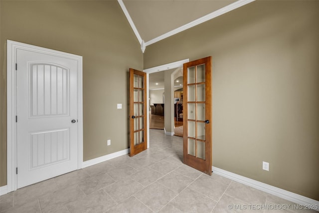 14651 S Gary Ave, Bixby, OK 74008 - spare room featuring french doors, crown molding, high vaulted ceiling, and light tile patterned flooring