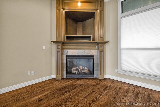 14651 S Gary Ave, Bixby, OK 74008 - detailed view of wood finished floors and a tile fireplace
