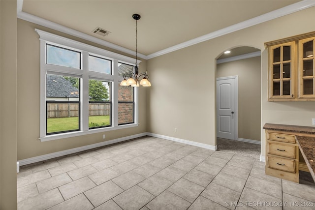 14651 S Gary Ave, Bixby, OK 74008 - unfurnished dining area featuring ornamental molding, arched walkways, a chandelier, and light tile patterned flooring