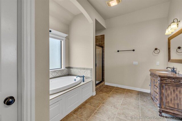 14651 S Gary Ave, Bixby, OK 74008 - bathroom featuring vanity, a shower stall, and a bath
