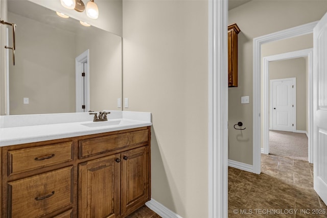 14651 S Gary Ave, Bixby, OK 74008 - bathroom with vanity and baseboards