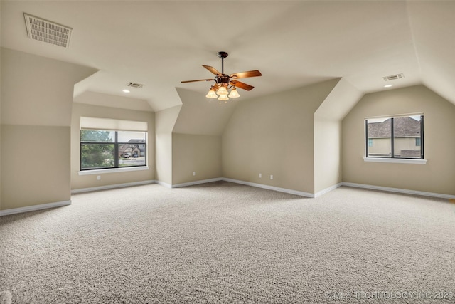 14651 S Gary Ave, Bixby, OK 74008 - additional living space with vaulted ceiling, carpet floors, ceiling fan, and recessed lighting