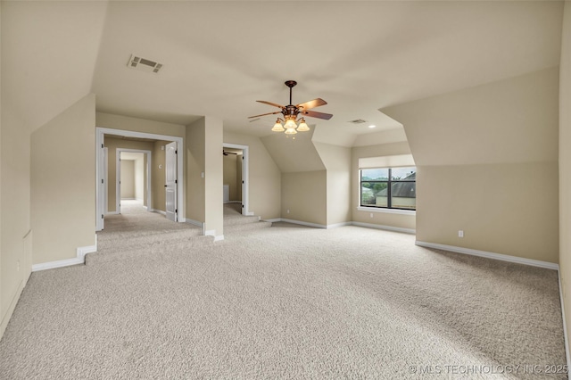 14651 S Gary Ave, Bixby, OK 74008 - additional living space with light colored carpet, a ceiling fan, and vaulted ceiling