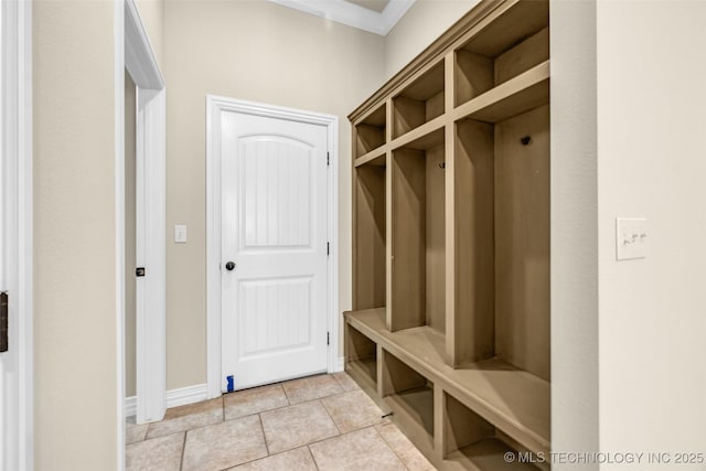 14651 S Gary Ave, Bixby, OK 74008 - mudroom featuring crown molding and light tile patterned floors
