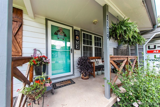1119 N Oklahoma Ave, Claremore, OK 74017 - doorway to property featuring a porch
