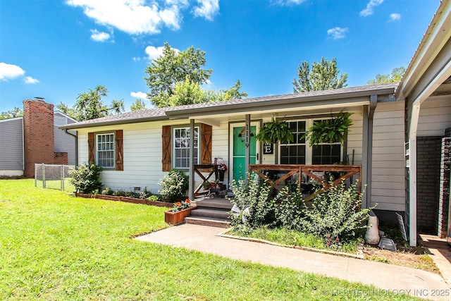 1119 N Oklahoma Ave, Claremore, OK 74017 - single story home featuring a front yard and covered porch