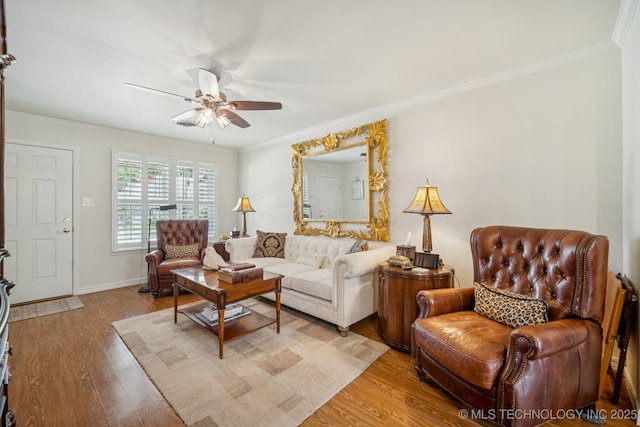 5612 S Newport Ave Unit 5612, Tulsa, OK 74105 - living area with light wood-style flooring, ceiling fan, and crown molding