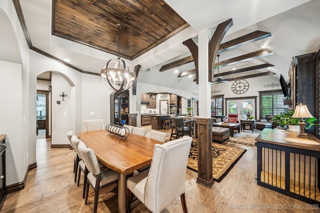 3818 W Phoenix Pl, Broken Arrow, OK 74011 - dining space featuring arched walkways, light wood-type flooring, a chandelier, crown molding, and ceiling fan