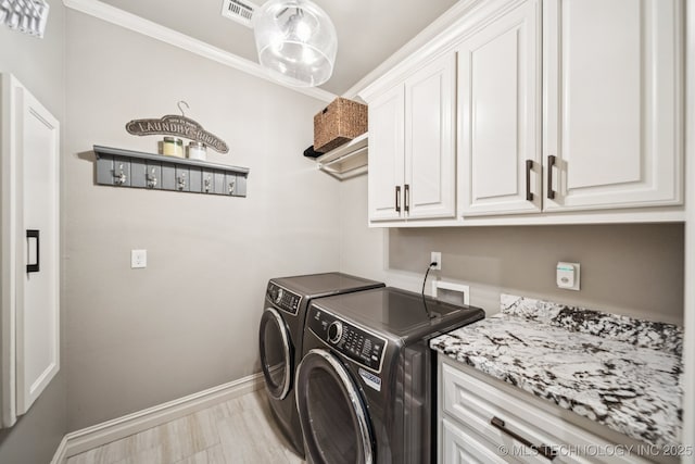 3818 W Phoenix Pl, Broken Arrow, OK 74011 - washroom with cabinet space, washer and clothes dryer, and ornamental molding