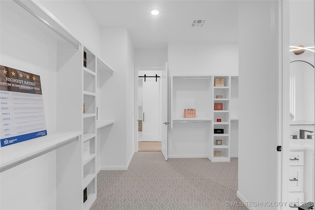 12005 S Vandalia Ave, Tulsa, OK 74137 - spacious closet with a barn door