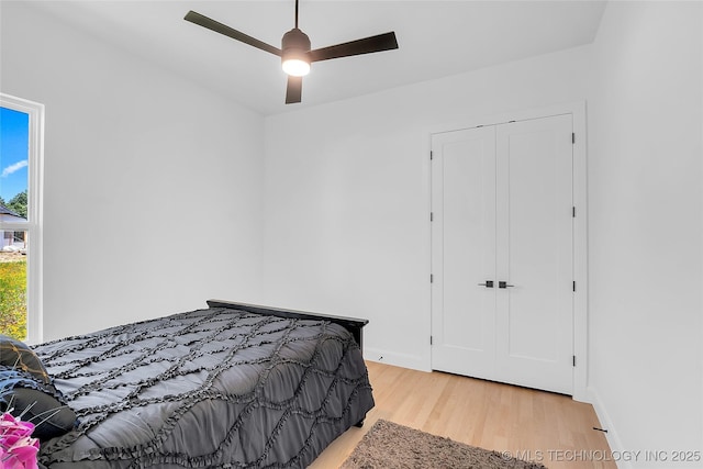 12005 S Vandalia Ave, Tulsa, OK 74137 - bedroom with light wood-style flooring and a ceiling fan