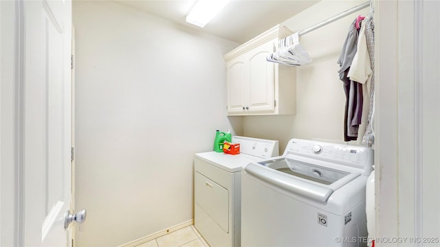 1010 W 120th St, Jenks, OK 74037 - laundry area with independent washer and dryer, cabinet space, and light tile patterned flooring