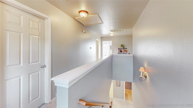 1010 W 120th St, Jenks, OK 74037 - hallway with an upstairs landing and baseboards