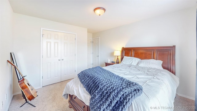 1010 W 120th St, Jenks, OK 74037 - bedroom with light colored carpet and a closet
