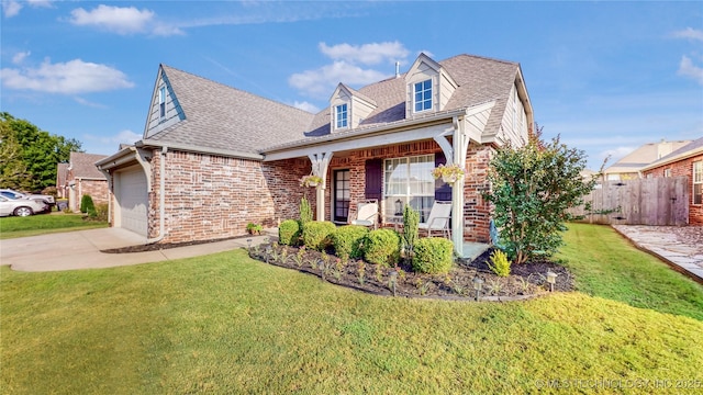 1010 W 120th St, Jenks, OK 74037 - view of front of home with brick siding, a porch, an attached garage, roof with shingles, and driveway