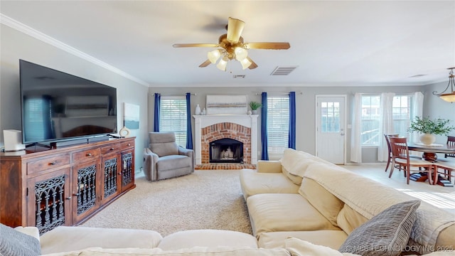 1010 W 120th St, Jenks, OK 74037 - living area featuring carpet flooring, a ceiling fan, crown molding, and a fireplace