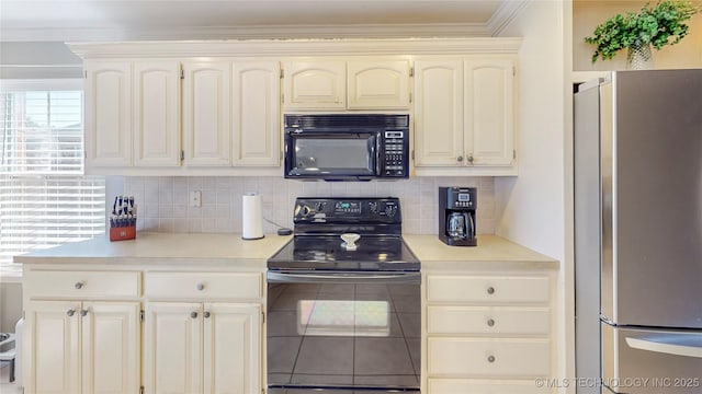 1010 W 120th St, Jenks, OK 74037 - kitchen with black appliances, backsplash, light countertops, and ornamental molding