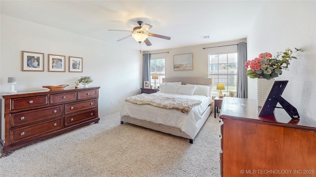 1010 W 120th St, Jenks, OK 74037 - bedroom featuring light colored carpet and ceiling fan