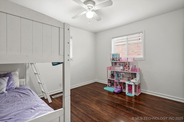 7547 E 27th St, Tulsa, OK 74129 - bedroom with wood finished floors and a ceiling fan