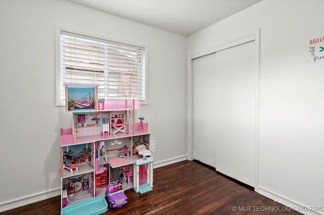 7547 E 27th St, Tulsa, OK 74129 - recreation room with wood finished floors and baseboards
