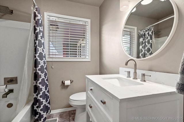 7547 E 27th St, Tulsa, OK 74129 - bathroom with vanity, tile patterned floors, plenty of natural light, and shower / bath combo with shower curtain