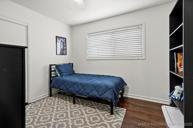 7547 E 27th St, Tulsa, OK 74129 - bedroom featuring wood finished floors and ceiling fan