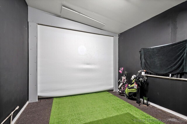 7547 E 27th St, Tulsa, OK 74129 - playroom with carpet and golf simulator