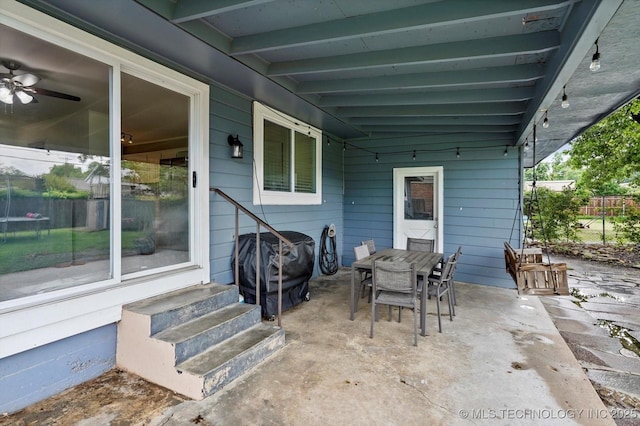7547 E 27th St, Tulsa, OK 74129 - view of patio with entry steps, grilling area, outdoor dining space, and a carport