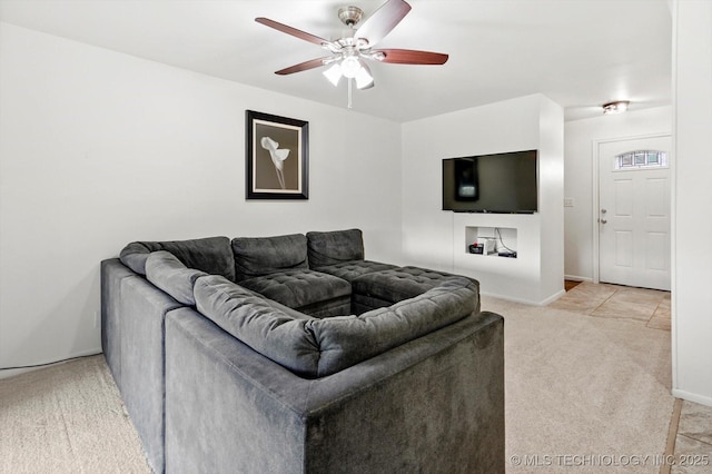 7547 E 27th St, Tulsa, OK 74129 - living area with light colored carpet and a ceiling fan