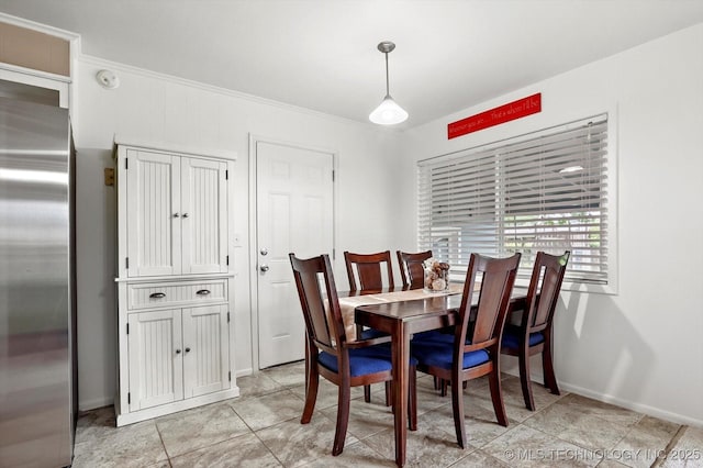7547 E 27th St, Tulsa, OK 74129 - dining area featuring baseboards and light tile patterned flooring