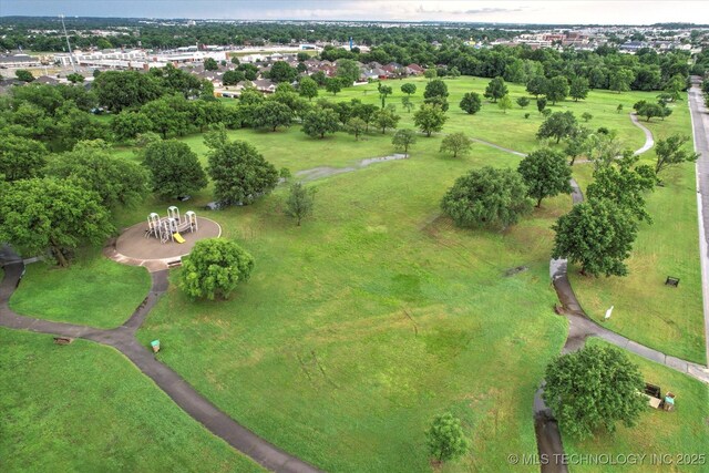 7547 E 27th St, Tulsa, OK 74129 - aerial view of property and surrounding area with a tree filled landscape