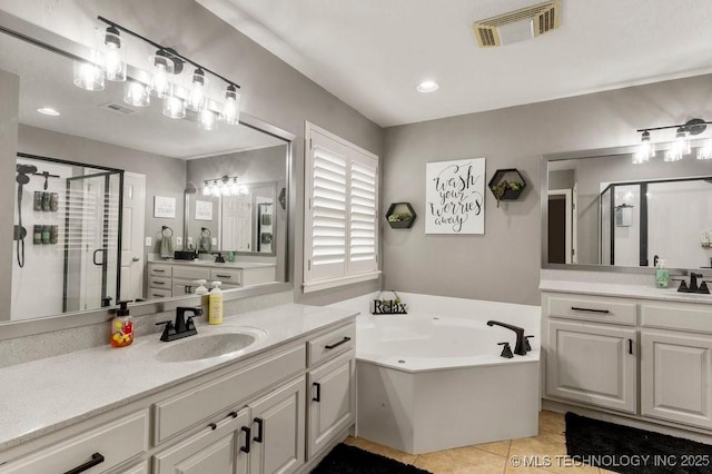 1516 W Trenton St, Broken Arrow, OK 74012 - bathroom with a stall shower, two vanities, a bath, and tile patterned flooring