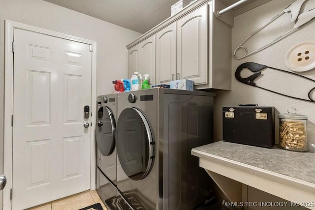 1516 W Trenton St, Broken Arrow, OK 74012 - washroom with separate washer and dryer, cabinet space, and light tile patterned flooring