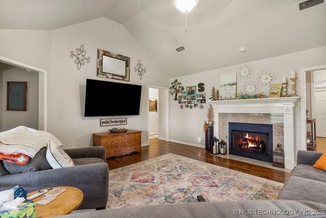 1516 W Trenton St, Broken Arrow, OK 74012 - living room with wood finished floors, a fireplace with flush hearth, and high vaulted ceiling