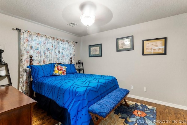 1516 W Trenton St, Broken Arrow, OK 74012 - bedroom featuring wood finished floors and ceiling fan