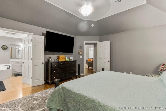 1516 W Trenton St, Broken Arrow, OK 74012 - bedroom with wood finished floors and connected bathroom