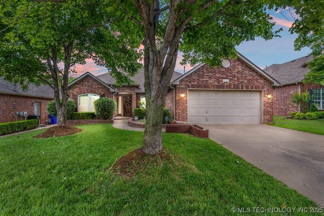 1516 W Trenton St, Broken Arrow, OK 74012 - view of front of property with brick siding, an attached garage, concrete driveway, a lawn, and roof with shingles