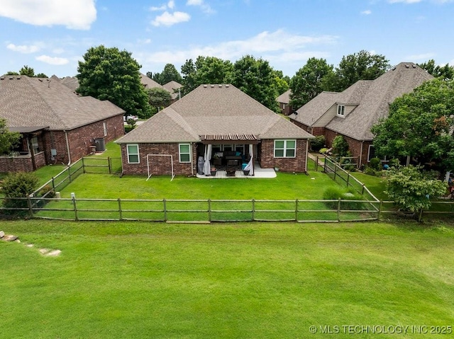 1516 W Trenton St, Broken Arrow, OK 74012 - rear view of house with a pergola, a patio area, brick siding, and a fenced backyard